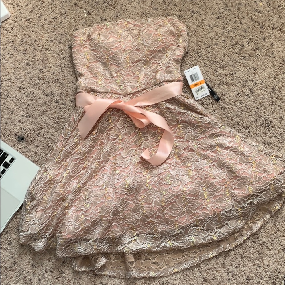 Short NEVER BEEN WORN formal dress from Macy’s.